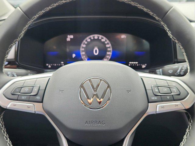 Photo of 2025 Deep Black Pearl Volkswagen Taos