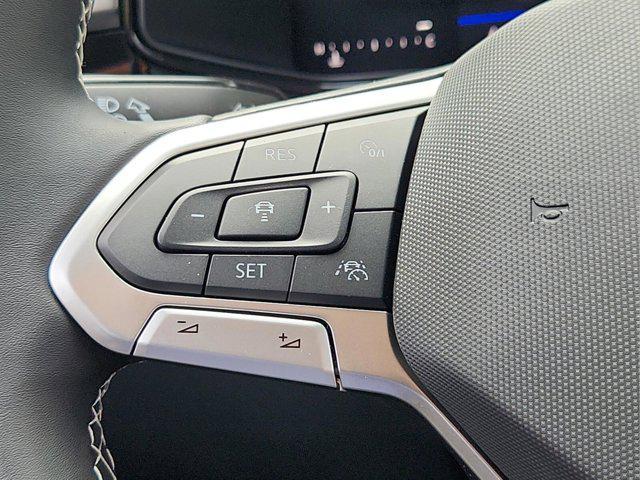 Photo of 2025 Deep Black Pearl Volkswagen Taos