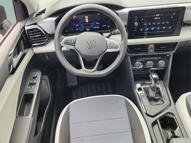 Photo of 2025 Deep Black Pearl Volkswagen Taos