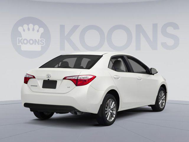 Photo of 2014 Super White Toyota Corolla