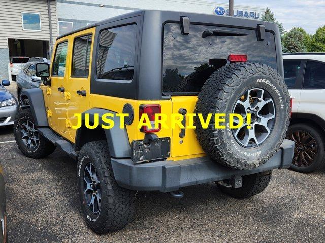 Photo of 2015 Baja Yellow Clearcoat Jeep Wrangler Unlimited