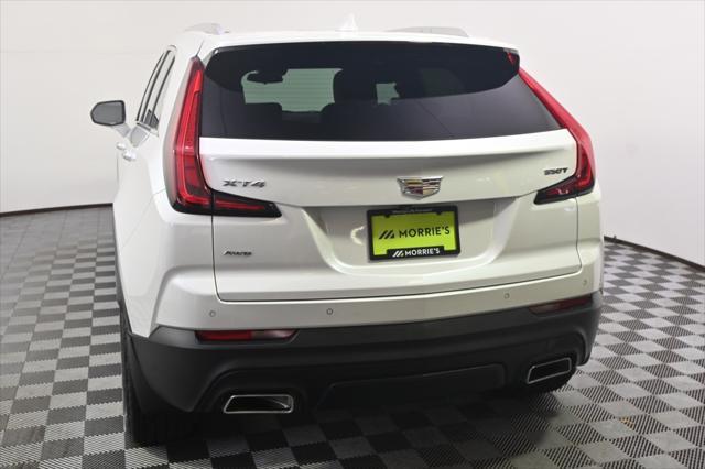 Photo of 2023 Crystal White Tricoat Cadillac XT4