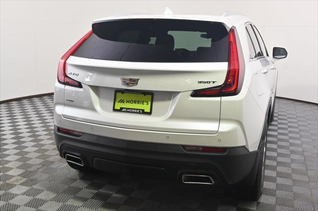 Photo of 2023 Crystal White Tricoat Cadillac XT4