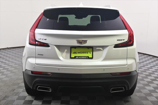 Photo of 2023 Crystal White Tricoat Cadillac XT4
