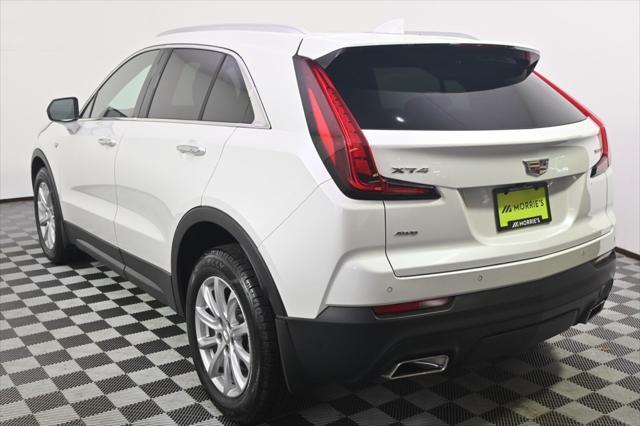 Photo of 2023 Crystal White Tricoat Cadillac XT4
