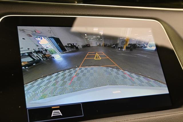 Photo of 2023 Crystal White Tricoat Cadillac XT4