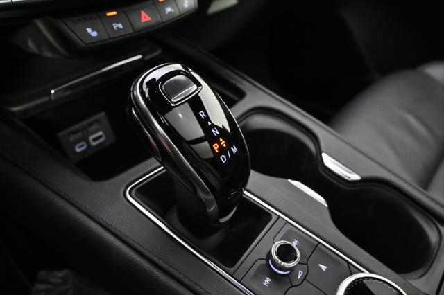 Photo of 2023 Crystal White Tricoat Cadillac XT4