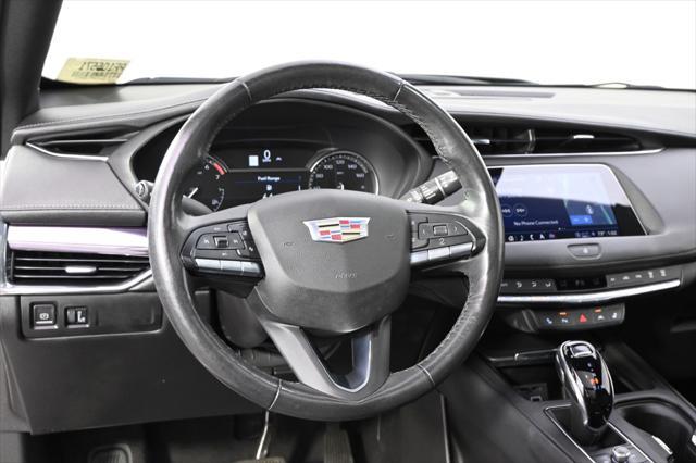 Photo of 2023 Crystal White Tricoat Cadillac XT4