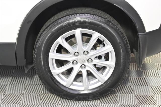 Photo of 2023 Crystal White Tricoat Cadillac XT4