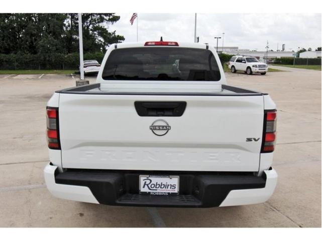 Photo of 2024 Glacier White Nissan Frontier