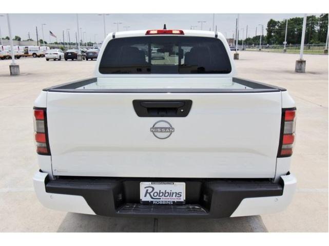 Photo of 2025 Glacier White Nissan Frontier
