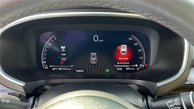 Photo of 2025 Performance Red Pearl Acura MDX