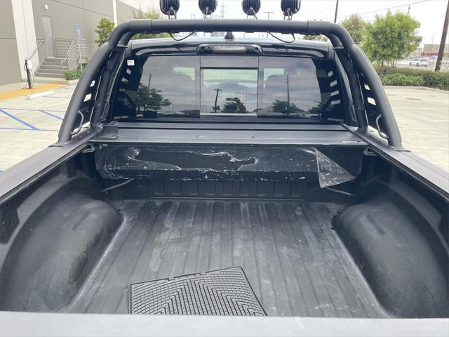 Photo of 2021 Diamond Black Crystal Pearlcoat RAM 1500