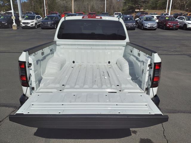 Photo of 2023 Glacier White Nissan Frontier