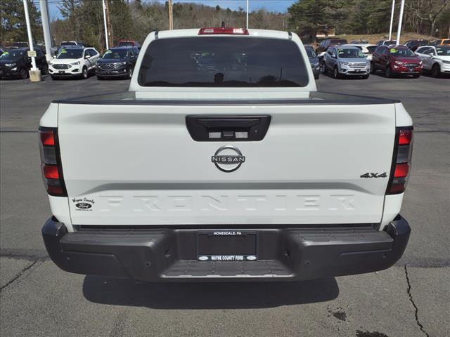 Photo of 2023 Glacier White Nissan Frontier