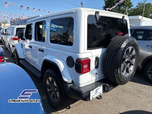Photo of 2019 Bright White Clearcoat Jeep Wrangler Unlimited