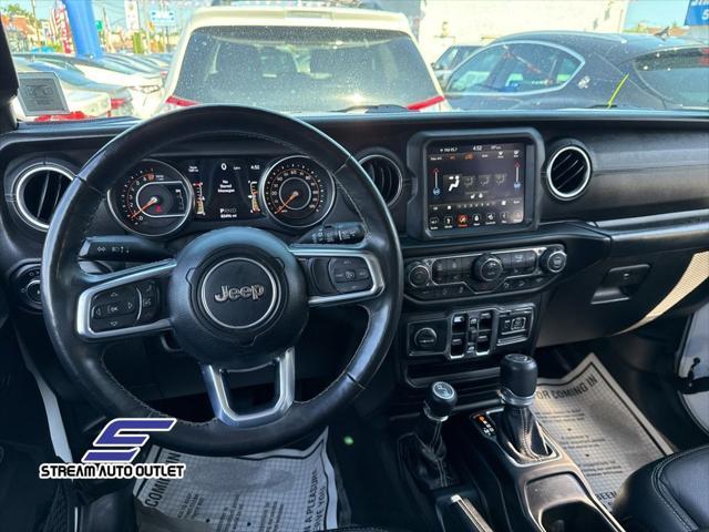 Photo of 2019 Bright White Clearcoat Jeep Wrangler Unlimited