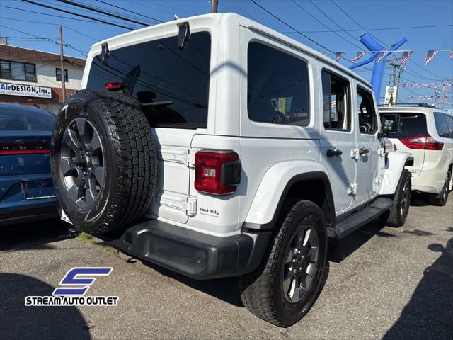 Photo of 2019 Bright White Clearcoat Jeep Wrangler Unlimited
