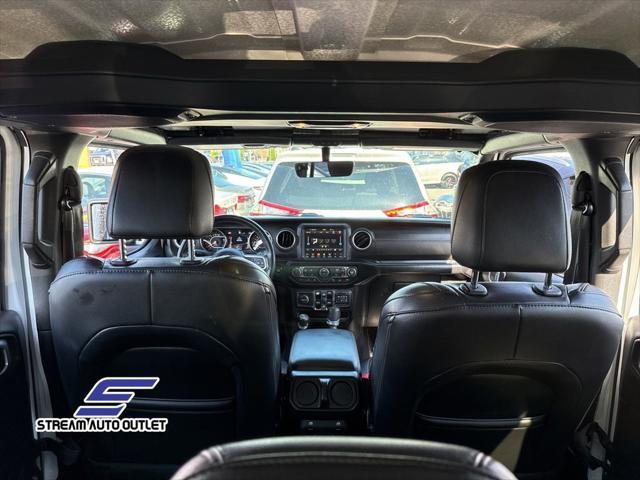 Photo of 2019 Bright White Clearcoat Jeep Wrangler Unlimited