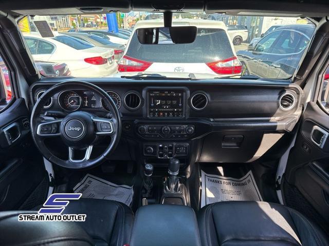 Photo of 2019 Bright White Clearcoat Jeep Wrangler Unlimited