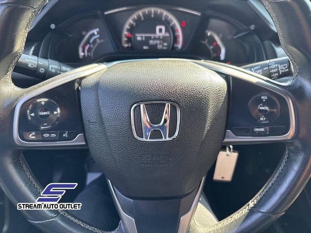 Photo of 2018 Aegean Blue Metallic Honda Civic