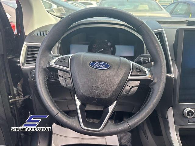 Photo of 2022 Stone Blue Metallic Ford Edge