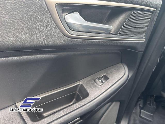 Photo of 2022 Stone Blue Metallic Ford Edge