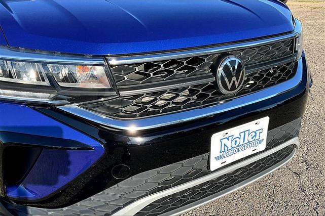 Photo of 2023 Blue Metallic Volkswagen Taos