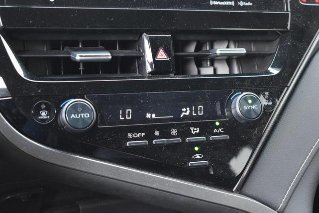 Photo of 2023 Midnight Black Metallic Toyota Camry