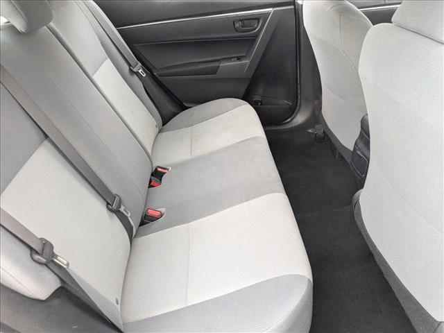 Photo of 2015 Super White Toyota Corolla