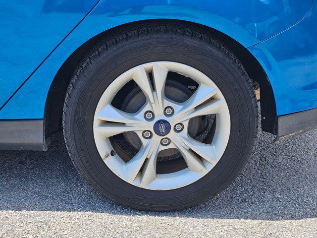 Photo of 2014 Blue Candy Tinted Clearcoat Ford Focus