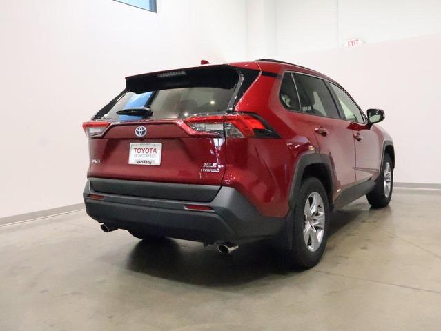 Photo of 2023 Ruby Flare Pearl Toyota RAV4 Hybrid