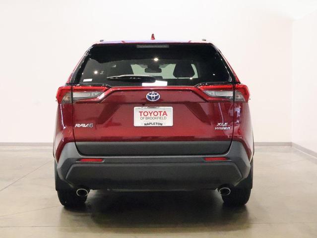 Photo of 2023 Ruby Flare Pearl Toyota RAV4 Hybrid