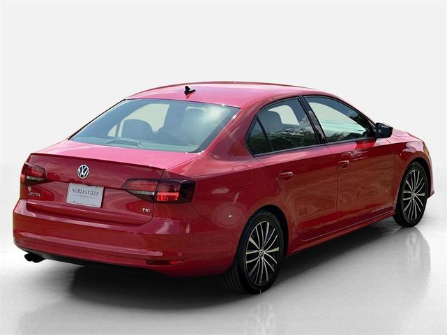 Photo of 2016 Tornado Red Volkswagen Jetta