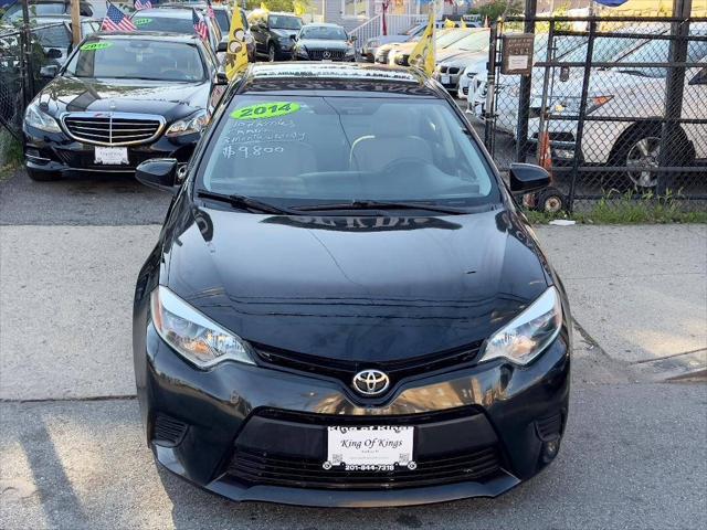 Photo of 2014 Black Sand Mica Toyota Corolla