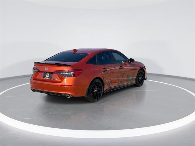 Photo of 2022 Orange Pearl Honda Civic Si