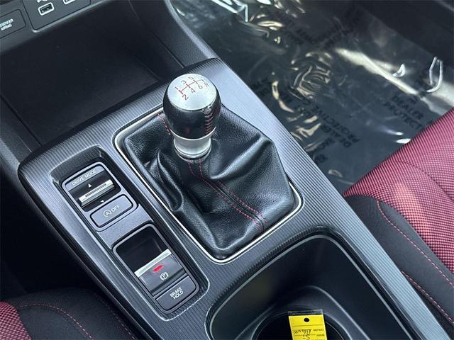 Photo of 2022 Orange Pearl Honda Civic Si