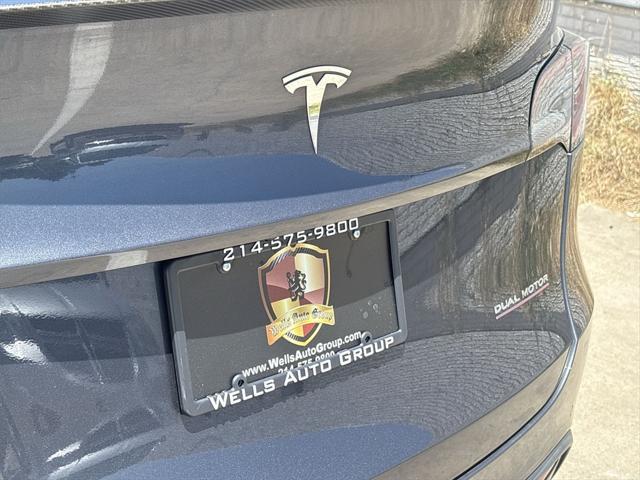 Photo of 2022 Deep Blue Metallic Tesla Model Y