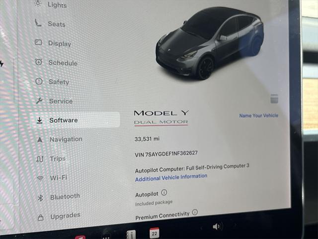 Photo of 2022 Deep Blue Metallic Tesla Model Y