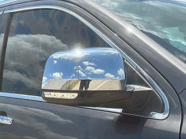 Photo of 2015 Granite Crystal Metallic Clearcoat Jeep Grand Cherokee