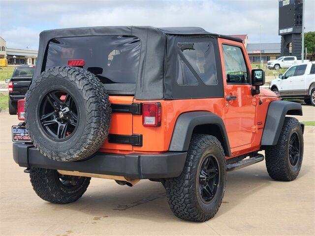 Photo of 2015 Sunset Orange Pearlcoat Jeep Wrangler