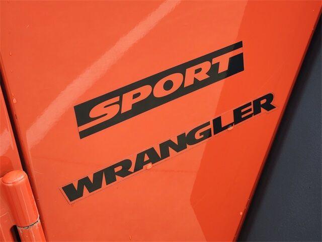 Photo of 2015 Sunset Orange Pearlcoat Jeep Wrangler