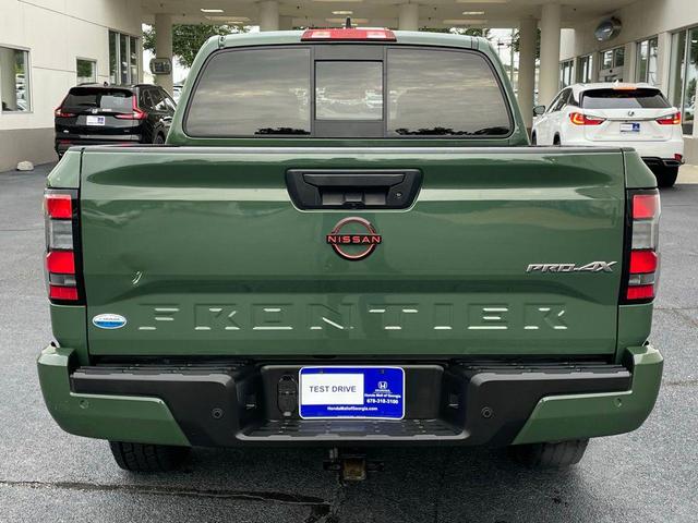 Photo of 2022 Tactical Green Metallic Nissan Frontier