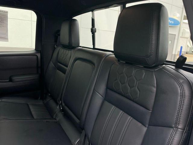 Photo of 2022 Tactical Green Metallic Nissan Frontier