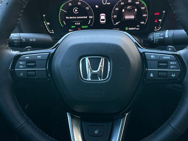 Photo of 2025 Platinum White Pearl Honda Accord Hybrid