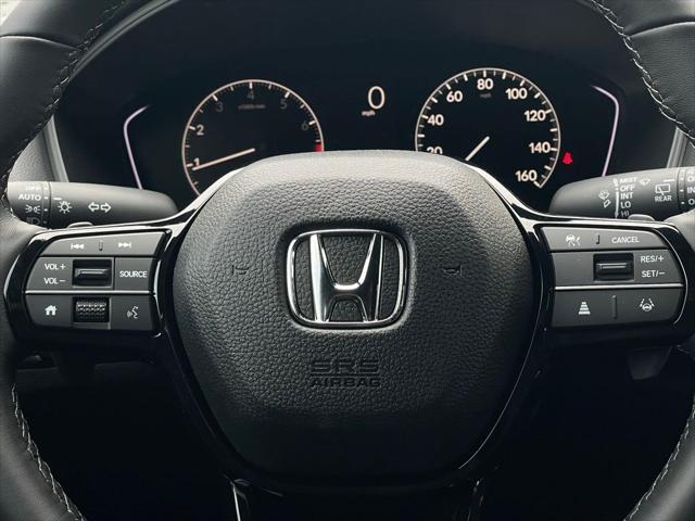 Photo of 2025 Platinum White Pearl Honda Civic
