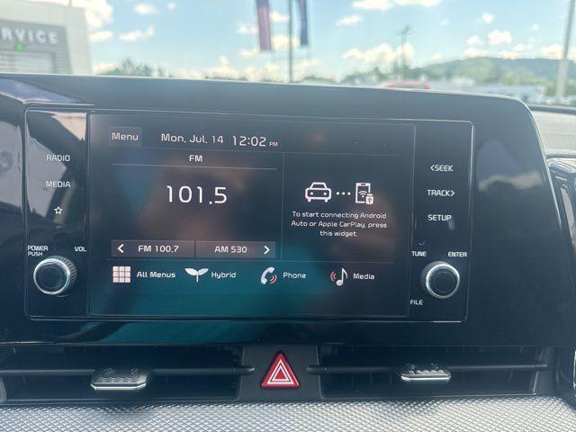 Photo of 2023 Snow White Pearl Kia Sportage Hybrid