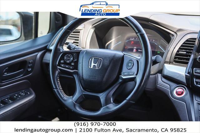 Photo of 2018 White Diamond Pearl Honda Odyssey