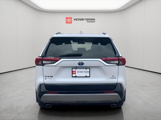 Photo of 2023 Pearl Toyota RAV4 Hybrid