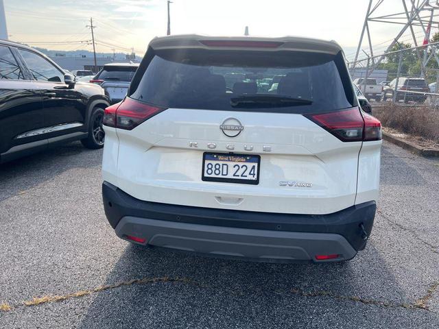 Photo of 2023 Pearl White Tricoat Nissan Rogue